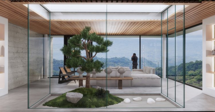 Modern indoor space with a glass enclosure, featuring a central bonsai tree planted in a grassy area with rocks, overlooking scenic mountains, with a man in a suit on a balcony in the background.