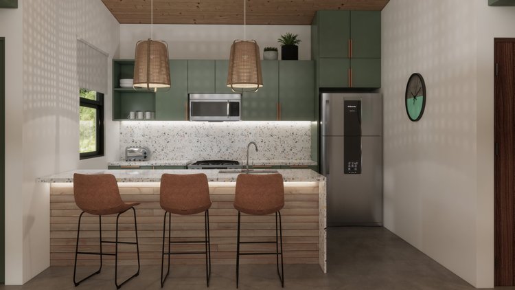 Modern kitchen with green cabinets, terrazzo backsplash, and a kitchen island with three brown barstools. Contains stainless steel refrigerator, microwave, toaster, and pendant lights.